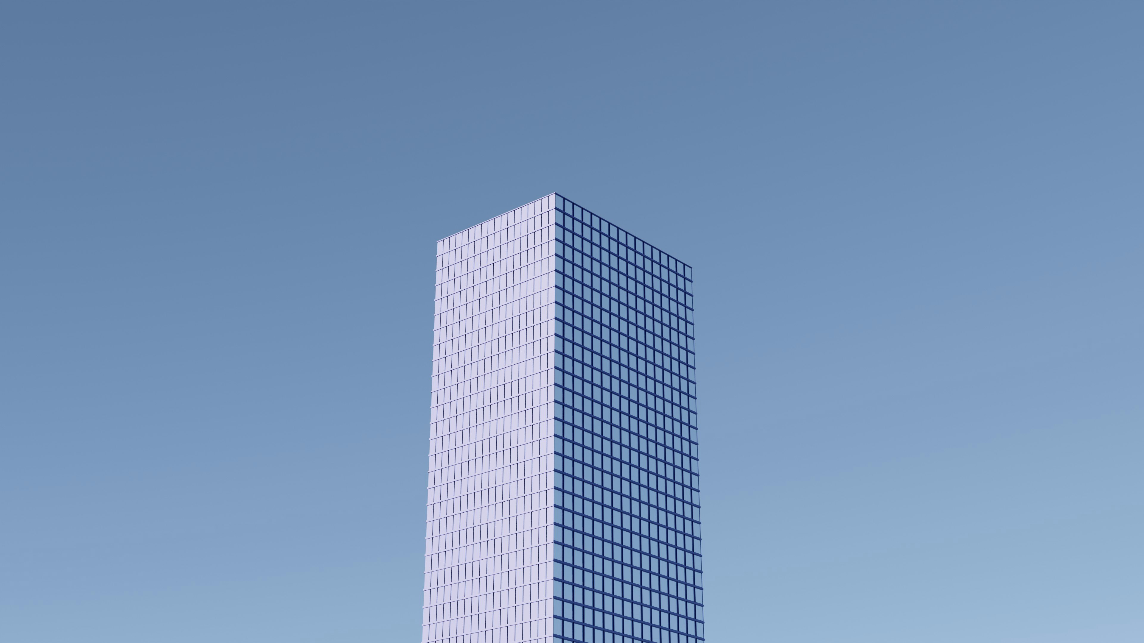 white concrete building under blue sky during daytime